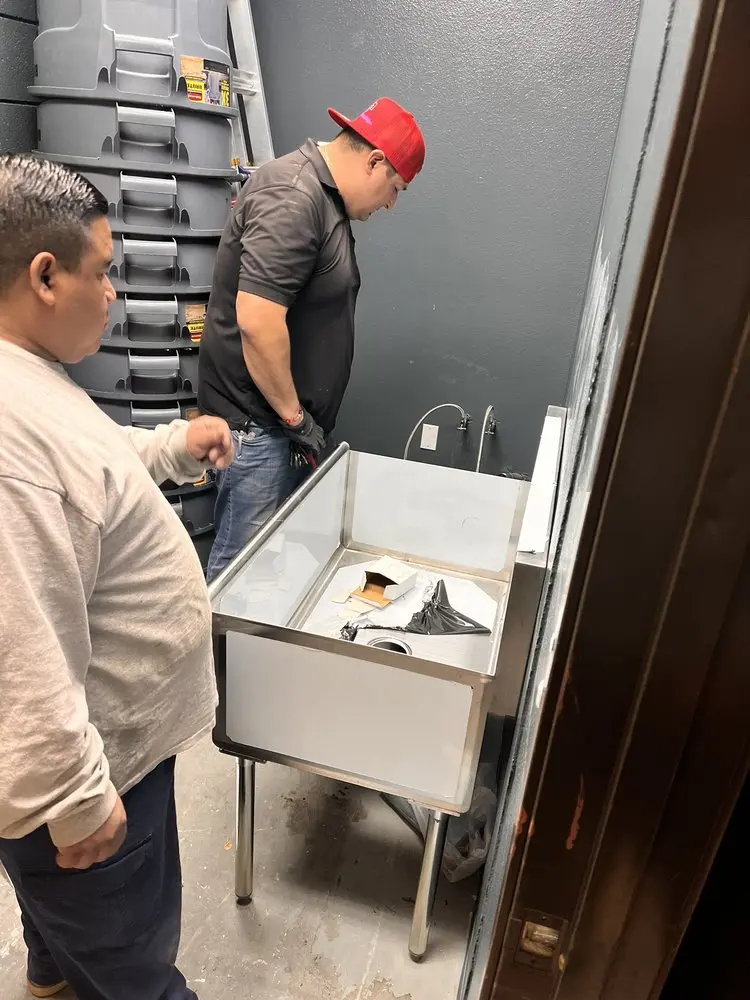 Commercial plumbing and sink installation in Manchester
